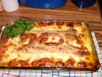 Rezept: Vegetarisch: Zwiebelpfannkuchen, gefüllt, gerollt, überbacken... Vegetarisch: Zwiebelpfannkuchen, gefüllt, gerollt, überbacken... - Rezept