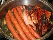 Grünkohleintopf mit Mettwürstchen und geräucherten Rippchen - Rezept