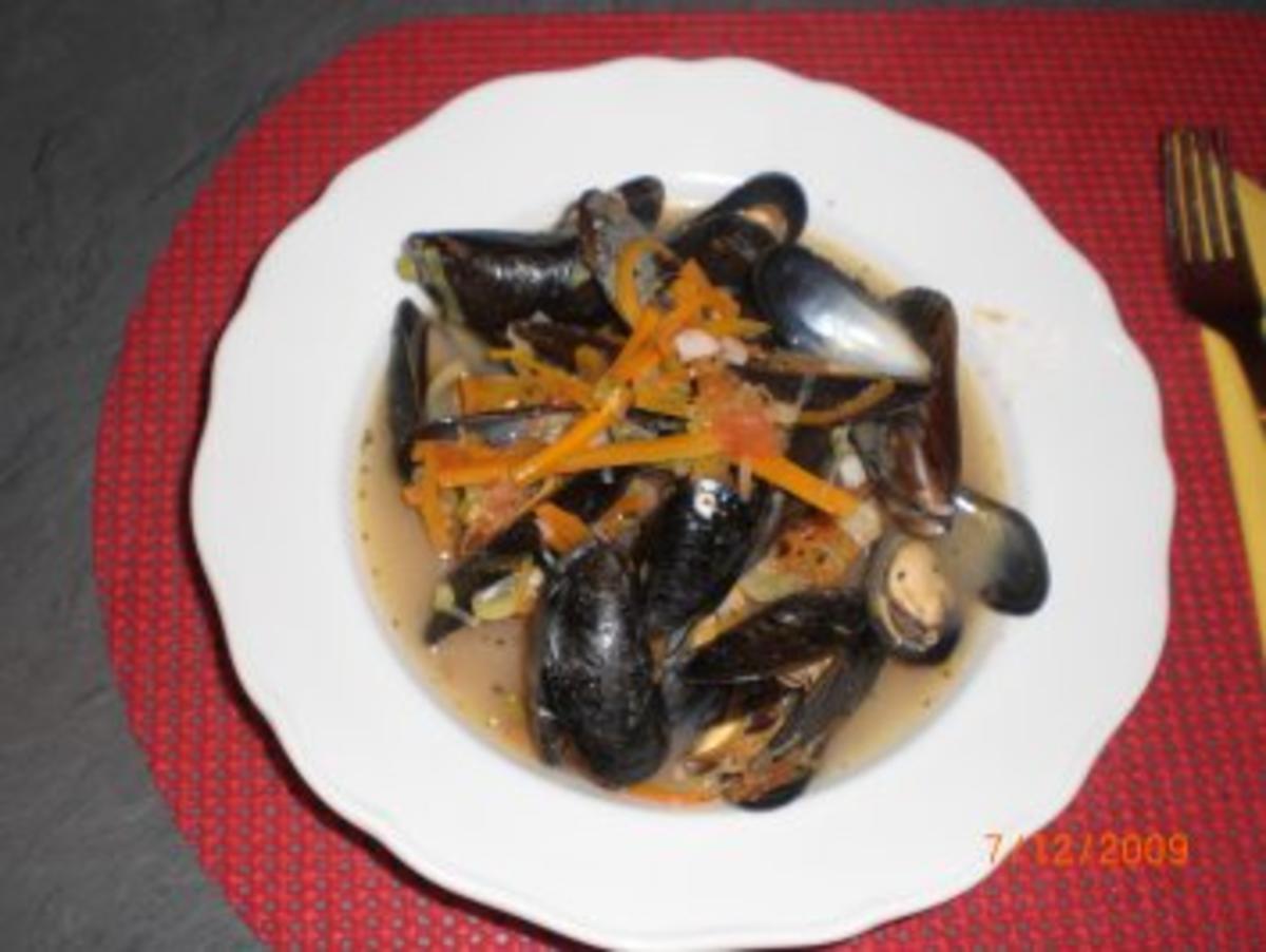 Muscheln mit frische Miesmuscheln und Knoblauchzehen - Rezept
Eingereicht von Oparoli