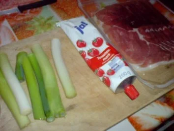 Rezept: Schweinerouladen mit Lauchzwiebeln und Speck gefüllt Bild Nr. 4 Schweinerouladen mit Lauchzwiebeln und Speck gefüllt - Rezept - Bild Nr. 4