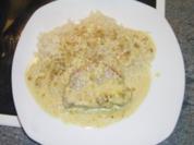 Schweineschnitzel oder Nierstück oder Filet an Zwiebelsahnesosse und Reis - Rezept