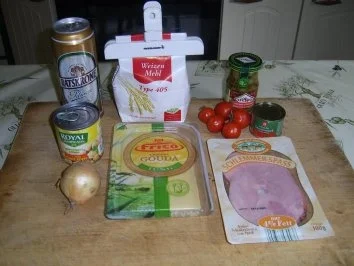 Schinkenpizza mit Zwiebel und Paprikaoliven - Rezept - Bild Nr. 2