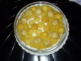 Rezept: Joghurt mit Mangopüree und Mango-Bananenkugeln und ein Hauch von Schokolade Bild Nr. 6 Joghurt mit Mangopüree und Mango-Bananenkugeln und ein Hauch von Schokolade - Rezept - Bild Nr. 6