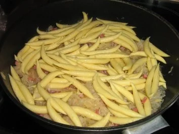 Rezept: Kraut-Schupfnudeln mit Speck und Schinken Bild Nr. 6 Kraut-Schupfnudeln mit Speck und Schinken - Rezept - Bild Nr. 6