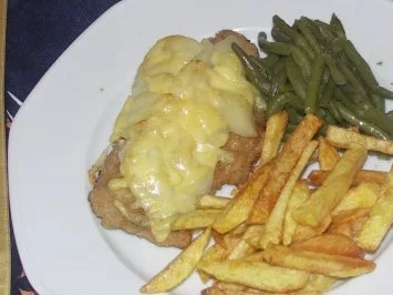 mit Birne überbackenes Schnitzel - Rezept