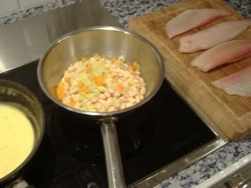 Tilapiafilet auf weißen Bohnen mit Erdnusssauce - Rezept - Bild Nr. 2