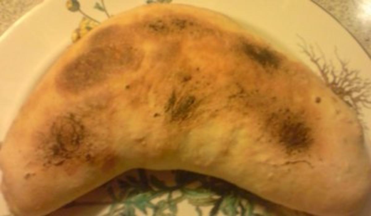 Bilder für Calzone mit Pizzateig s. Pizza Salami und Tomatensugo s.KB. - Rezept