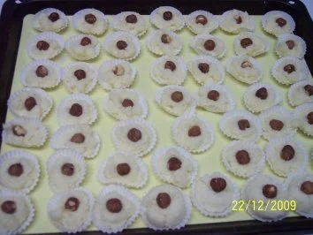 Rezept: Kokoskugeln ( Raffaello) Bild Nr. 3 Kokoskugeln ( Raffaello) - Rezept - Bild Nr. 3