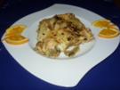 Maultaschen-Putenstreifen mit Kürbiskernen und Käse überbacken - Rezept