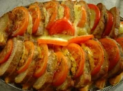 Lachs-Braten vom Schwein mit Käse und Tomaten - Rezept