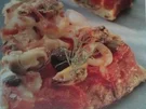 Pizza Frutti di Mare auf einer Tomaten-Paprika-Sauce - Rezept