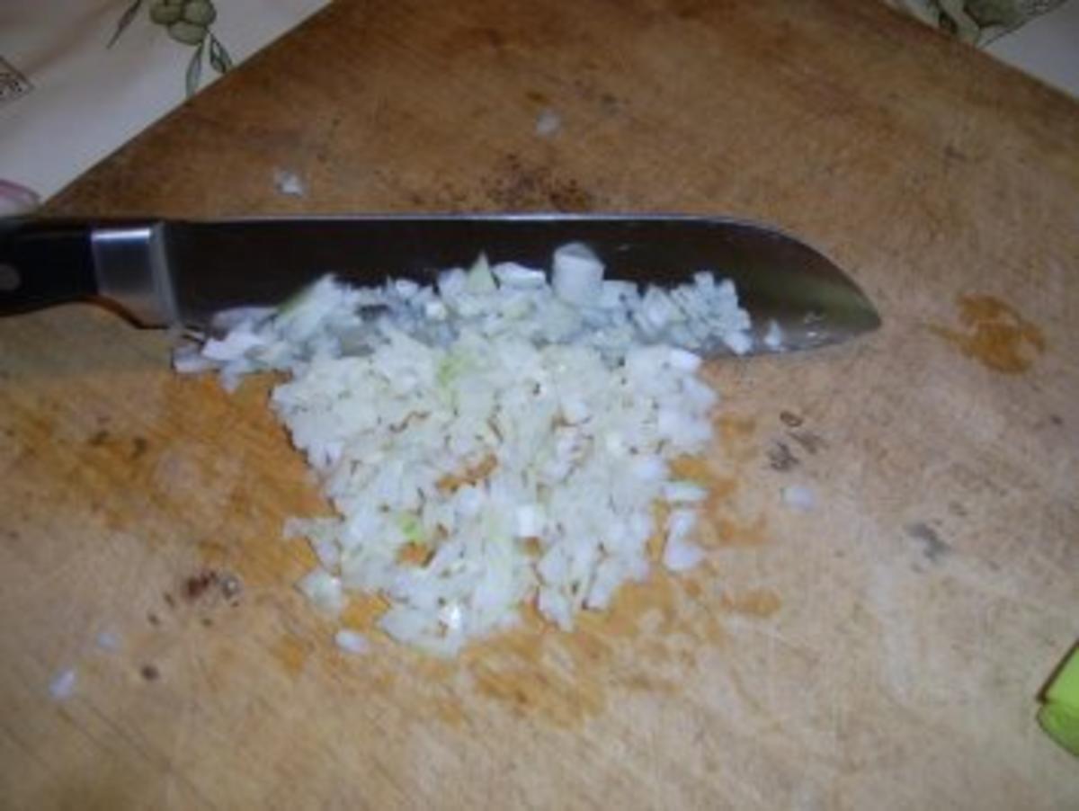 Gefüllte Hühnerbrüstchen mit Schmorgemüse in einer Lauchrolle. - Rezept - Bild Nr. 3