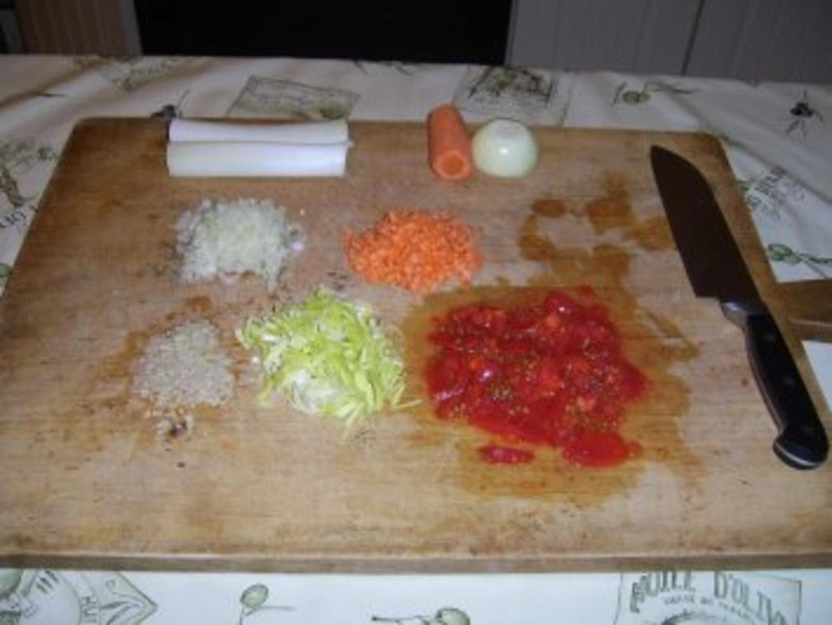 Gefüllte Hühnerbrüstchen mit Schmorgemüse in einer Lauchrolle. - Rezept - Bild Nr. 4