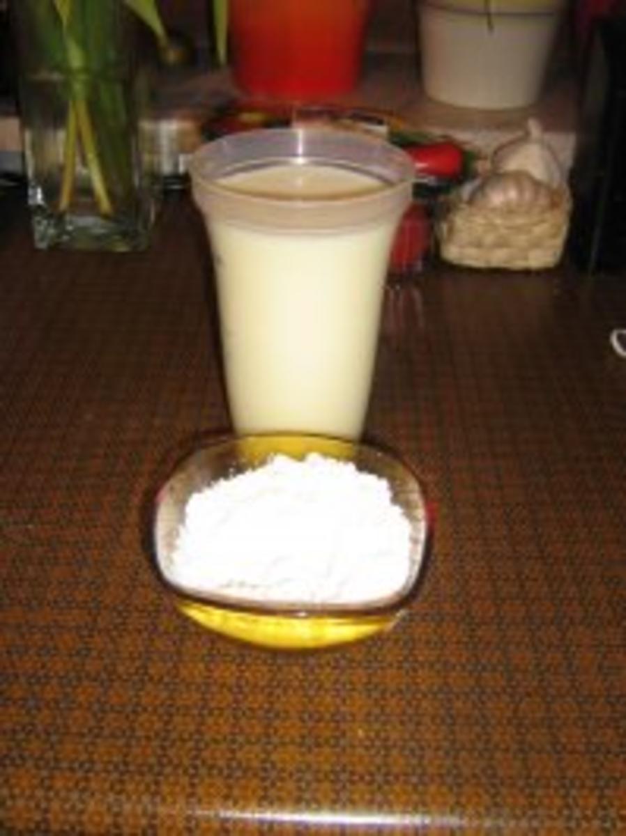 Vanillepudding mit Walnüssen unter einem Schokogitter - Rezept - Bild Nr. 3