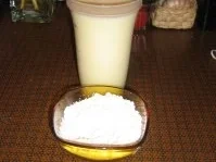 Vanillepudding mit Walnüssen unter einem Schokogitter - Rezept - Bild Nr. 3