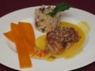 Perlhuhnbrust mit Orangen-Peperoni-Soße und Pilzrisotto - Rezept