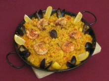 Paella andalusisch mit Fisch und Fleisch - Rezept