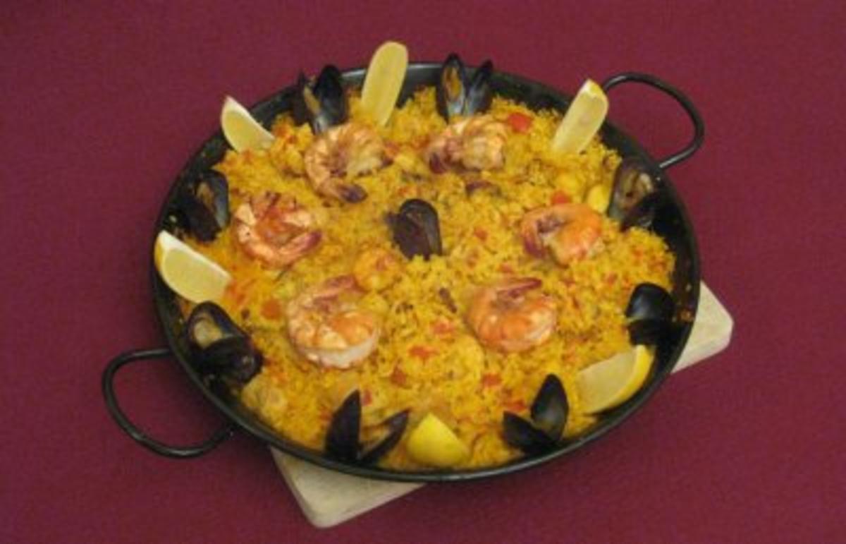 Bilder für Paella andalusisch mit Fisch und Fleisch - Rezept