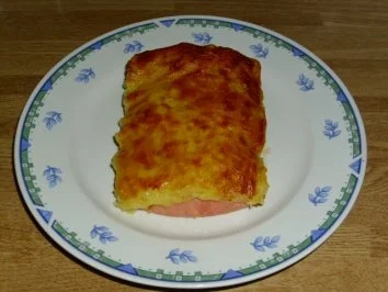 Rezept: Knacker unter der Haube Knacker unter der Haube - Rezept