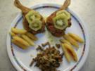 Barbarie Entenkeulen gefüllt mit Gewürzstollen und Orangen, an Curryschupfnudeln und Pfifferlingen - Rezept