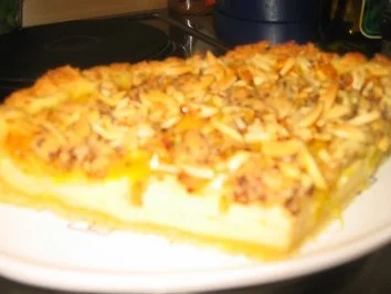 Rezept: Backwaren: Käsekuchen mit Orangenfilets und Kakaostreusel! Backwaren: Käsekuchen mit Orangenfilets und Kakaostreusel! - Rezept