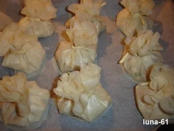 Rezept: AUMONIERES AUX SCAMPIS ET COQUILLES ST JACQUES Bild Nr. 5 AUMONIERES AUX SCAMPIS ET COQUILLES ST JACQUES - Rezept - Bild Nr. 5