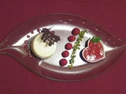 Panna-Cotta-Törtchen mit beschwipsten Himbeeren - Rezept