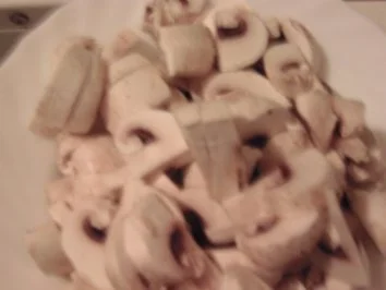 Kräuterknödel mit Tomaten-Champignon-Sauce - Rezept - Bild Nr. 5