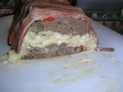Hackfleischrolle Sorpresa - Der Rollbraten hält im Inneren eine Überraschung bereit und er ist sehr lecker- - Rezept