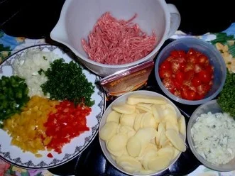 Rezept: Gemüse-Hackbällchen auf Tomatenbett und Bratkartoffeln Bild Nr. 2 Gemüse-Hackbällchen auf Tomatenbett und Bratkartoffeln - Rezept - Bild Nr. 2