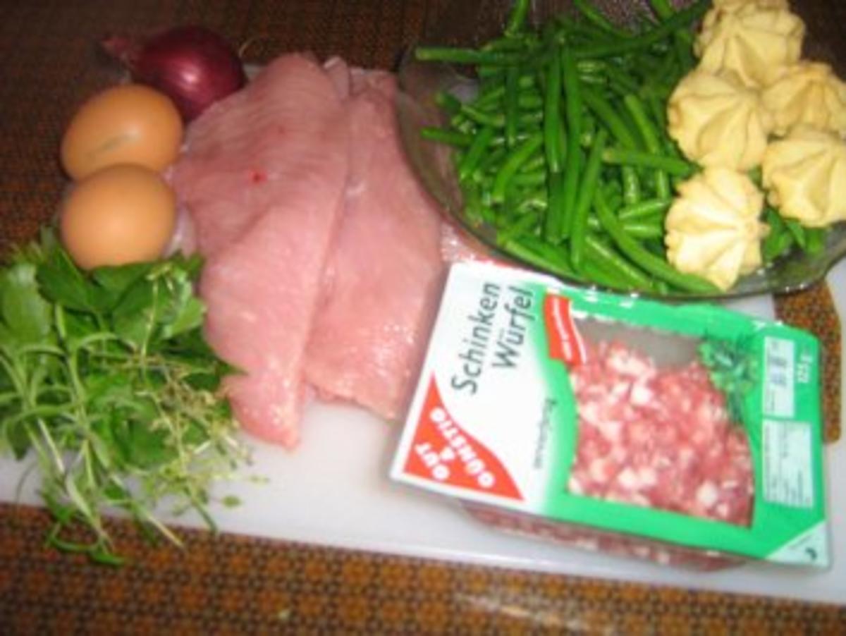 Kräuterschnitzel mit Bohnengemüse und Herzoginkartöffelchen - Rezept - Bild Nr. 2