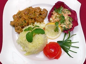 Rezept: Lamm Biryani mit Cashewkernen und Rosinenreis Lamm Biryani mit Cashewkernen und Rosinenreis - Rezept