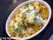 Knusper-Seelachs auf Tomatennudeln - Rezept