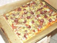 Pizza mit Hirschrohesser - Rezept