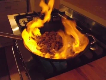 Flambiertes Kalbsgeschnetzeltes mit Cognac-Rahm - Rezept