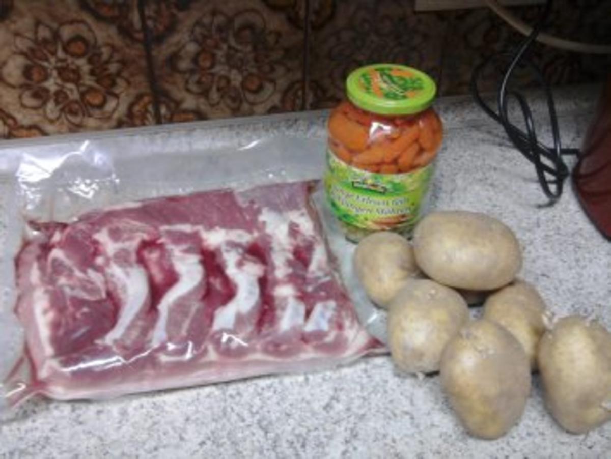 Schweinebauch mit Kartoffelpürree und Erbsen und Karotten-Gemüse - Rezept - Bild Nr. 2
