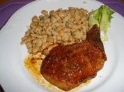 Fleischgerichte - Schweinskotelett pikant mit gebratenen Spätzle - Rezept