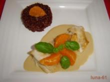 NILBARSCH AN FLAMBIERTER ZITRUS-COGNACSAUCE UND ROTEM REIS - Rezept