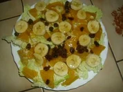 Chinakohlsalat mit Rumrosinen und Obst - Rezept