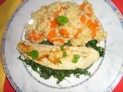 Pangasius auf Rucolabett an Gemüserisotto - Rezept