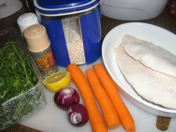 Pangasius auf Rucolabett an Gemüserisotto - Rezept - Bild Nr. 2