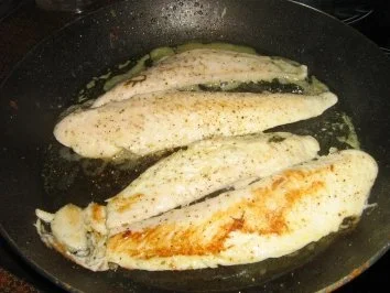 Pangasius auf Rucolabett an Gemüserisotto - Rezept - Bild Nr. 6
