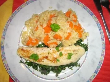 Pangasius auf Rucolabett an Gemüserisotto - Rezept - Bild Nr. 9