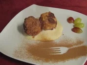 Kartäuserklöße auf einer Weinschaumsoße - Rezept