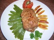 Schweinerückensteak mit Kräuterkruste, Zuckerschoten und Fingernudeln - Rezept