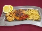 Rezept: Linguine con scampi, pomodori e zucchini in sugo di Vino Bianco, dazu Fisch Linguine con scampi, pomodori e zucchini in sugo di Vino Bianco, dazu Fisch - Rezept