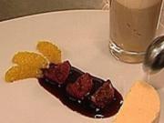 Grand-Marnier-Parfait mit Gewürzorangen und Tobleronemousse mit Eierlikörhäubchen an Barolo-Feigen - Rezept