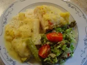 Hähnchenbrustfilet exotisch --- mit Mango-Ananas-Sauce und Porree überbacken - Rezept