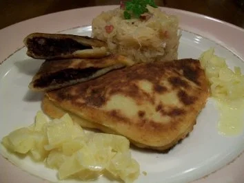 Rezept: gebratene Blutwurst-Kartoffel-Raviolo an Apfel-Zwiebel-Ragout Bild Nr. 2 gebratene Blutwurst-Kartoffel-Raviolo an Apfel-Zwiebel-Ragout - Rezept - Bild Nr. 2