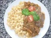 Rahmgulasch mit Pfifferlingen an Cellentani - Rezept